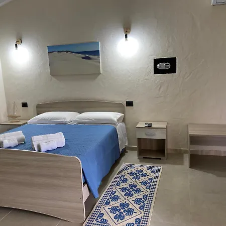 Κατάλυμα σε φάρμα Is Arenas Biancas *